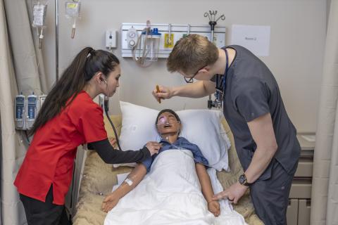 Nurses working on a pediatric patient