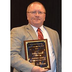 Jeff Hart with award